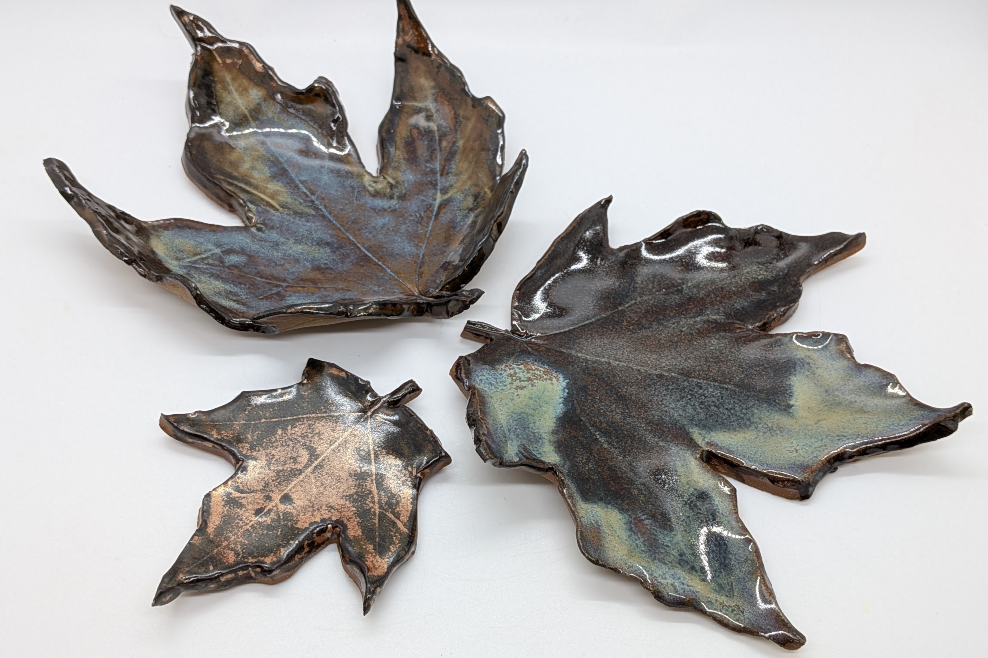 Leaf Spoon Rests - Made using the leaves of my own maple trees. The autumnal vibes in these spoon rests / tea-bag holders are a great, decorative addition to any coffee table. Plus they complement my mini prep bowls beautifully. 

You'll want to leave these out and ready for any-time use by your family and guests!

Large: $20 each
Small: $10

More on the way! - 20