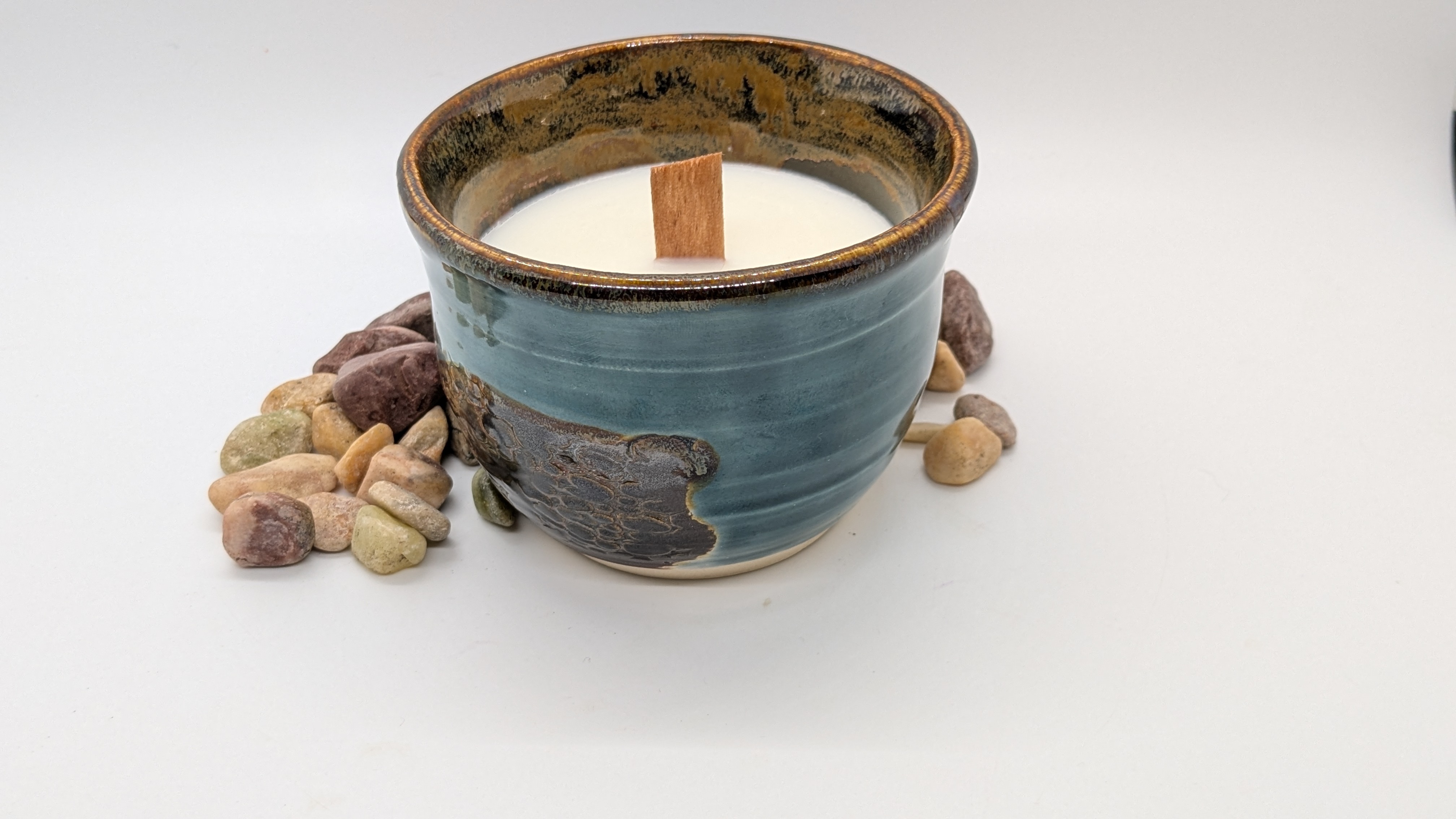 Vanilla Woodlands Juice Cup Candle - Large - Reminisce about time spent in the woods! Soy wax, lightly scented with a blend of evergreens and rich vanilla. All in a vessel featuring a subtle river rock texture beneath a rich, watery hue. 

Dragonfly Den candles are intended to give you extended use. Once the candle is burned, simply scoop out wax and wick remnants, pop the vessel into the dishwasher, and keep it for your favorite beverage. Wine, juice, and hot tea are all right at home in these cups. 

Color: Rainforest & Jasper 
Holds 8 fl. oz.




 - 22