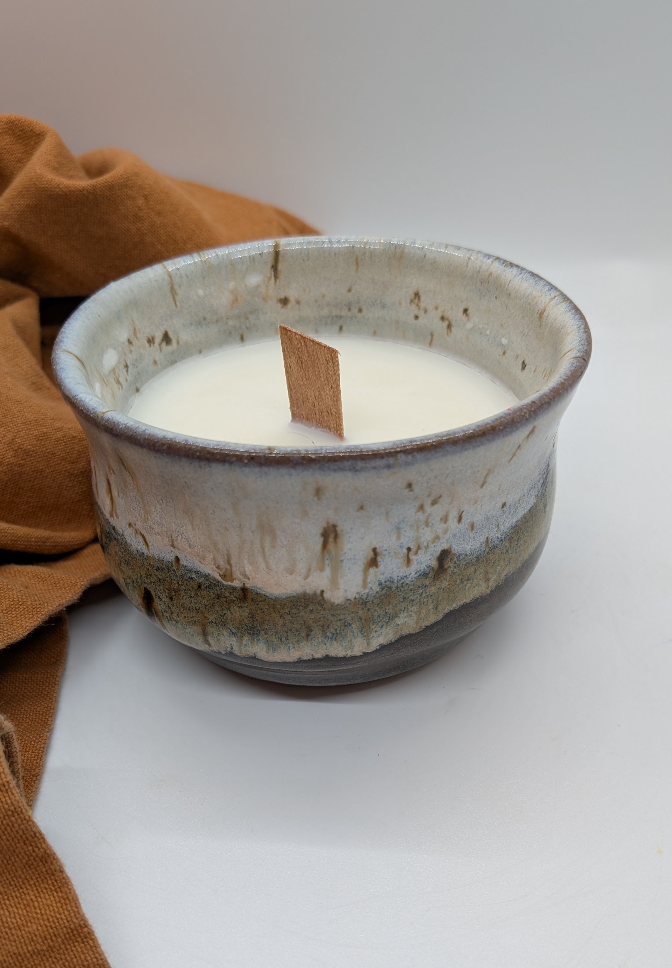 Birch Juice Cup Candle - Large - Colors inspired by birch trees and morning fog. Lightly scented with Fig and Jasmine. A lovely cup for your favorite hot or cold beverage, once you've burned through the candle.

Holds approx. 8 fl. oz. - 22
